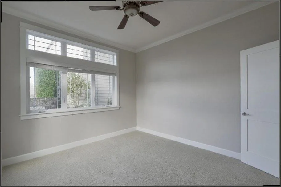 Freshly cleaned light carpet in an empty room, move-out ready, Oceanside, CA